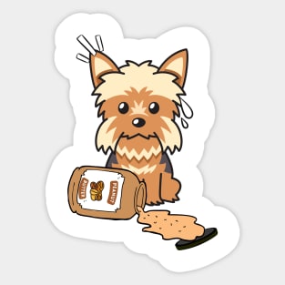 Cute Yorkshire Terrier spilled a jar of peanut butter Sticker